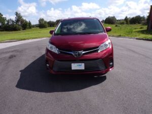 Red Toyota Sienna with BraunAbility Side Entry Automatic Fold Out conversion