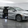 Silver Honda Odyssey with BraunAbility Side Entry Automatic In Floor conversion