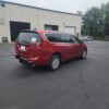 Red Chrysler Pacifica with Driverge Rear Entry Manual Fold Out conversion