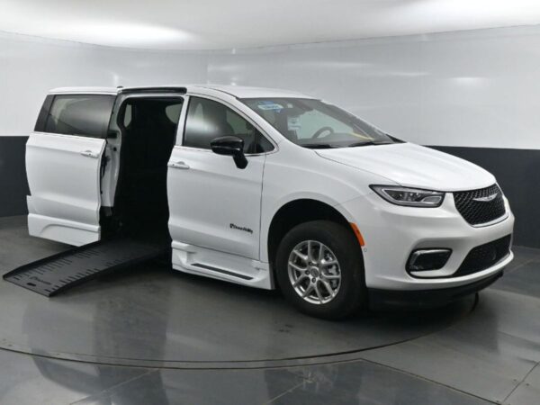 White Chrysler Pacifica with BraunAbility Side Entry Automatic Fold Out conversion
