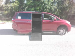 Red Toyota Sienna with Vantage Mobility Side Entry Automatic In Floor conversion