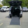 Silver Toyota Sienna with Driverge Rear Entry Manual Fold Out conversion