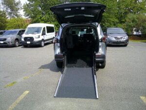 Silver Toyota Sienna with Driverge Rear Entry Manual Fold Out conversion