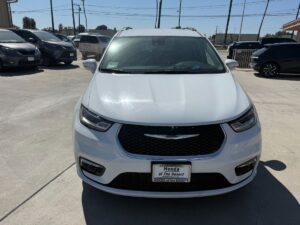 White Chrysler Pacifica with Driverge Side Entry Automatic Fold Out conversion