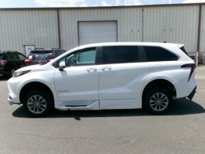 White Toyota Sienna with BraunAbility Side Entry Automatic Fold Out conversion