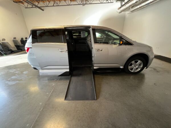 Silver Honda Odyssey with Vantage Mobility Side Entry Automatic In Floor conversion