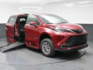 Red Toyota Sienna with BraunAbility Side Entry Automatic Fold Out conversion