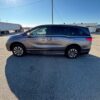 Grey Honda Odyssey with BraunAbility Side Entry Automatic In Floor conversion