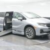 Silver Honda Odyssey with BraunAbility Side Entry Automatic In Floor conversion