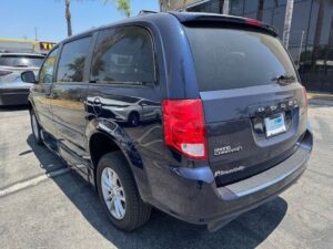 Blue Dodge Grand Caravan with BraunAbility Side Entry Automatic Fold Out conversion