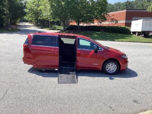 Red Chrysler Pacifica with Driverge Side Entry Automatic Fold Out conversion