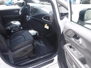 White Chrysler Pacifica with BraunAbility Side Entry Automatic In Floor conversion