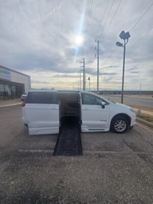 White Chrysler Voyager with BraunAbility Side Entry Automatic Fold Out conversion