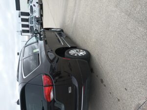 Brown Chrysler Pacifica with BraunAbility Side Entry Automatic Fold Out conversion