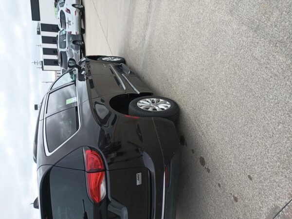 Brown Chrysler Pacifica with BraunAbility Side Entry Automatic Fold Out conversion