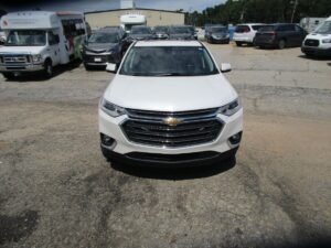 White Chevrolet Traverse with BraunAbility Side Entry Automatic In Floor conversion