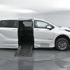 White Toyota Sienna with BraunAbility Side Entry Automatic Fold Out conversion