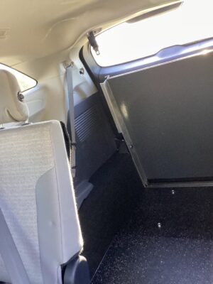 Grey Toyota Sienna with Driverge Rear Entry Manual Fold Out conversion