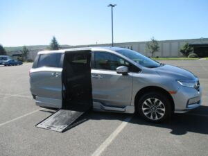 Silver Honda Odyssey with BraunAbility Side Entry Automatic In Floor conversion