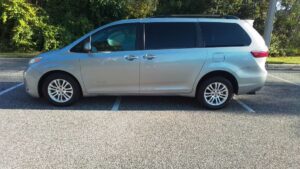 Silver Toyota Sienna with BraunAbility Rear Entry Automatic Fold Out conversion