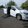 White Chrysler Voyager with Driverge Side Entry Automatic Fold Out conversion