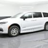 White Chrysler Pacifica with BraunAbility Side Entry Automatic Fold Out conversion