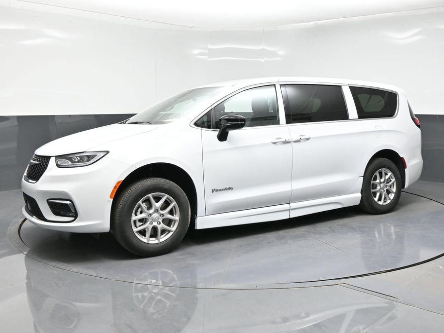 White Chrysler Pacifica with BraunAbility Side Entry Automatic Fold Out conversion