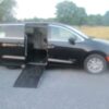 Black Chrysler Pacifica with Driverge Side Entry Automatic Fold Out conversion