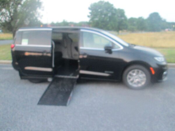 Black Chrysler Pacifica with Driverge Side Entry Automatic Fold Out conversion