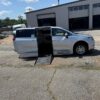 Silver Chrysler Voyager with BraunAbility Side Entry Automatic Fold Out conversion