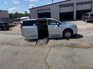 Silver Chrysler Voyager with BraunAbility Side Entry Automatic Fold Out conversion