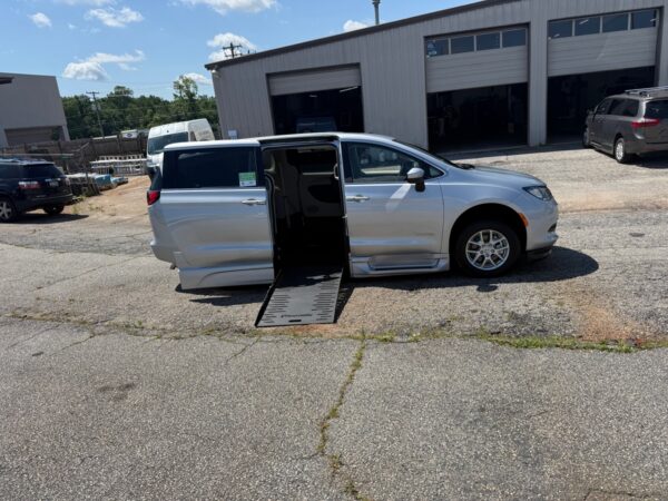 Silver Chrysler Voyager with BraunAbility Side Entry Automatic Fold Out conversion