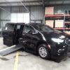 Black Chrysler Pacifica with BraunAbility Side Entry Automatic In Floor conversion