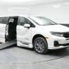 White Honda Odyssey with BraunAbility Side Entry Automatic In Floor conversion