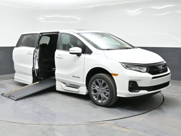 White Honda Odyssey with BraunAbility Side Entry Automatic In Floor conversion