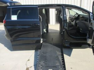 Black Chrysler Voyager with BraunAbility Side Entry Automatic Fold Out conversion