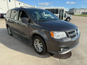 Grey Dodge Grand Caravan with Driverge Side Entry Automatic Fold Out conversion