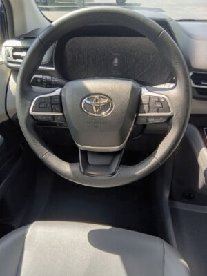 Blue Toyota Sienna with Driverge Rear Entry Manual Fold Out conversion