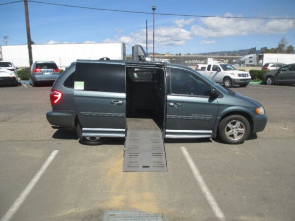 Blue Dodge Grand Caravan with BraunAbility Side Entry Automatic Fold Out conversion