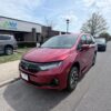 Red Honda Odyssey with BraunAbility Side Entry Automatic In Floor conversion