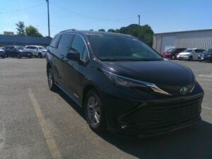 Black Toyota Sienna with Driverge Rear Entry Manual Fold Out conversion