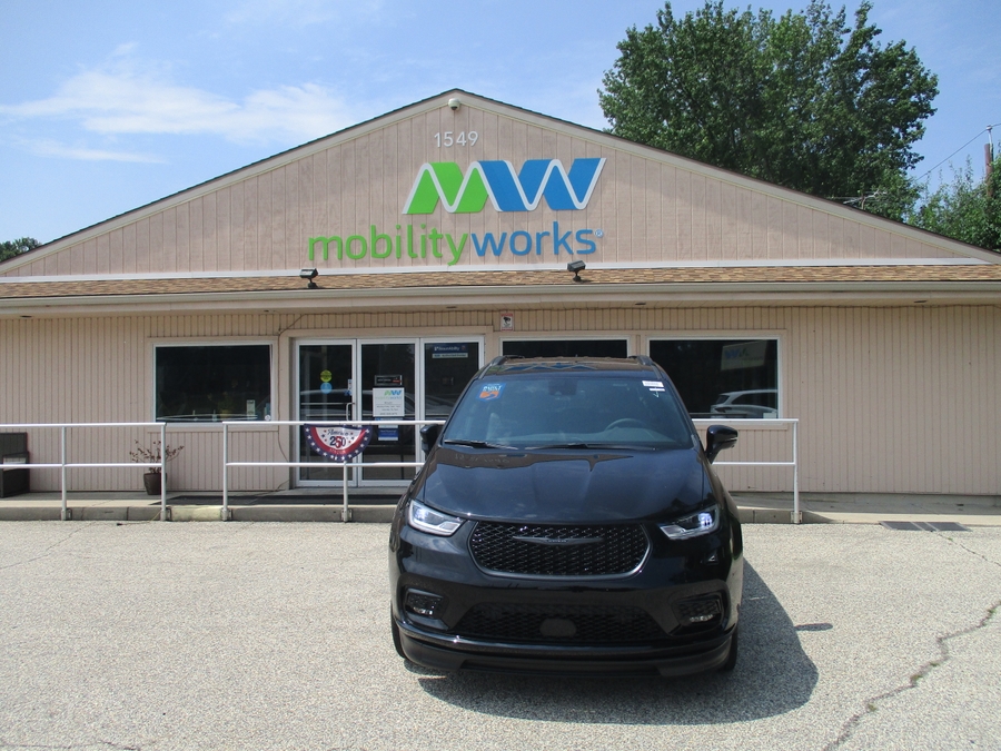 Black Chrysler Pacifica with BraunAbility Side Entry Automatic In Floor conversion