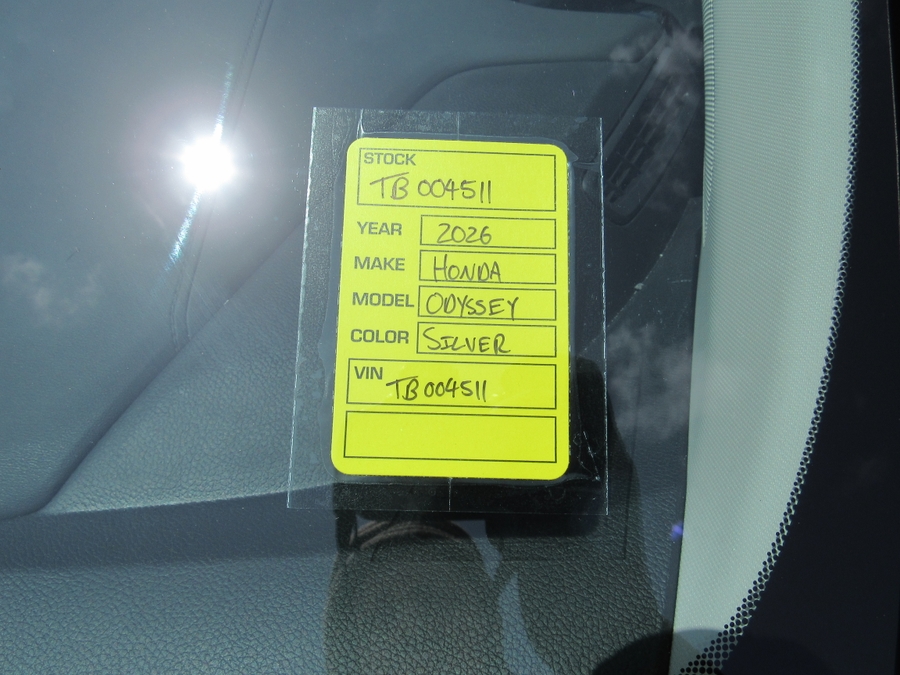 Silver Honda Odyssey with BraunAbility Side Entry Automatic In Floor conversion