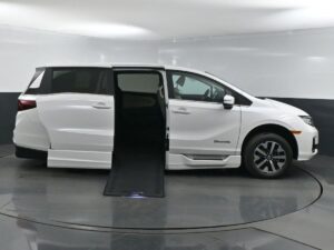White Honda Odyssey with BraunAbility Side Entry Automatic In Floor conversion