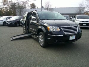 Black Chrysler Town and Country with BraunAbility Side Entry Automatic Fold Out conversion