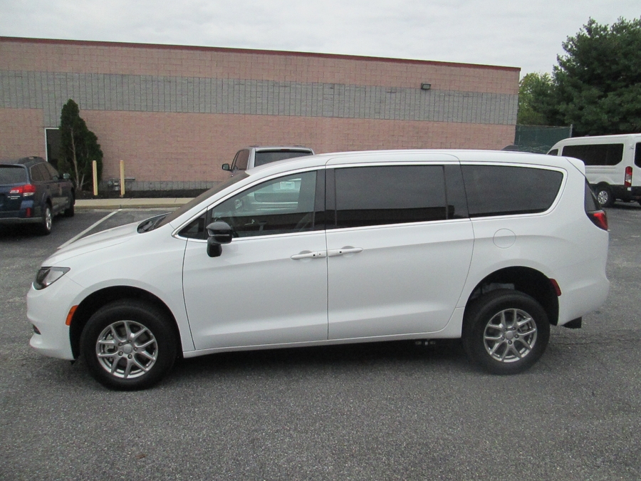 White Chrysler Pacifica with FR Conversions Rear Entry Manual Fold Out conversion