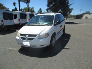 White Dodge Grand Caravan with Vantage Mobility Side Entry Automatic Fold Out conversion