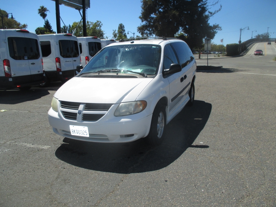 White Dodge Grand Caravan with Vantage Mobility Side Entry Automatic Fold Out conversion