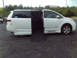 White Toyota Sienna with BraunAbility Side Entry Automatic In Floor conversion