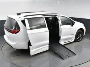 White Chrysler Pacifica with BraunAbility Side Entry Automatic Fold Out conversion